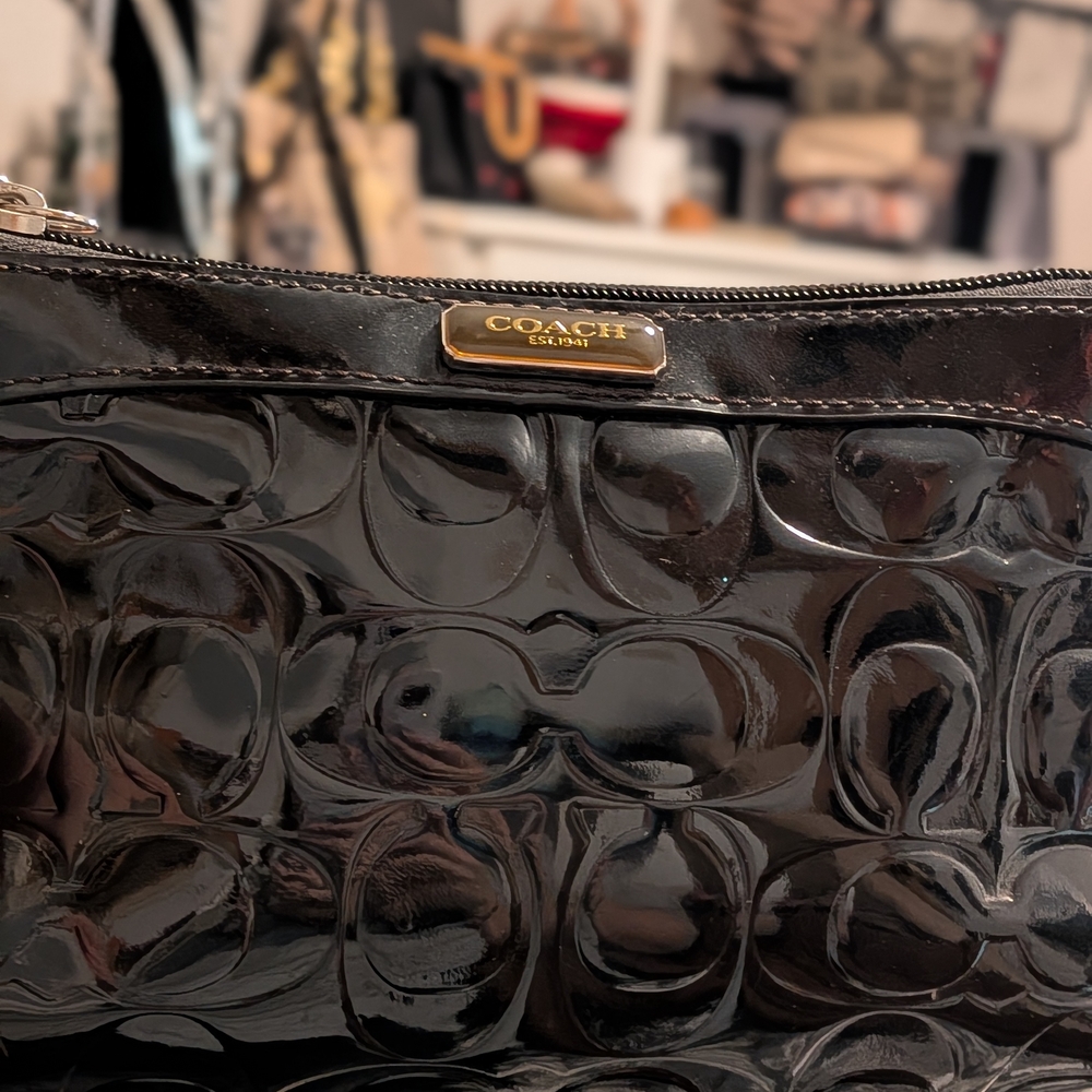 Coach Glossy Black Embossed Clutch